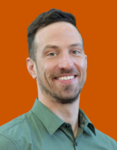 Headshot photo of Counsellor Patrick smiling with a orange background.